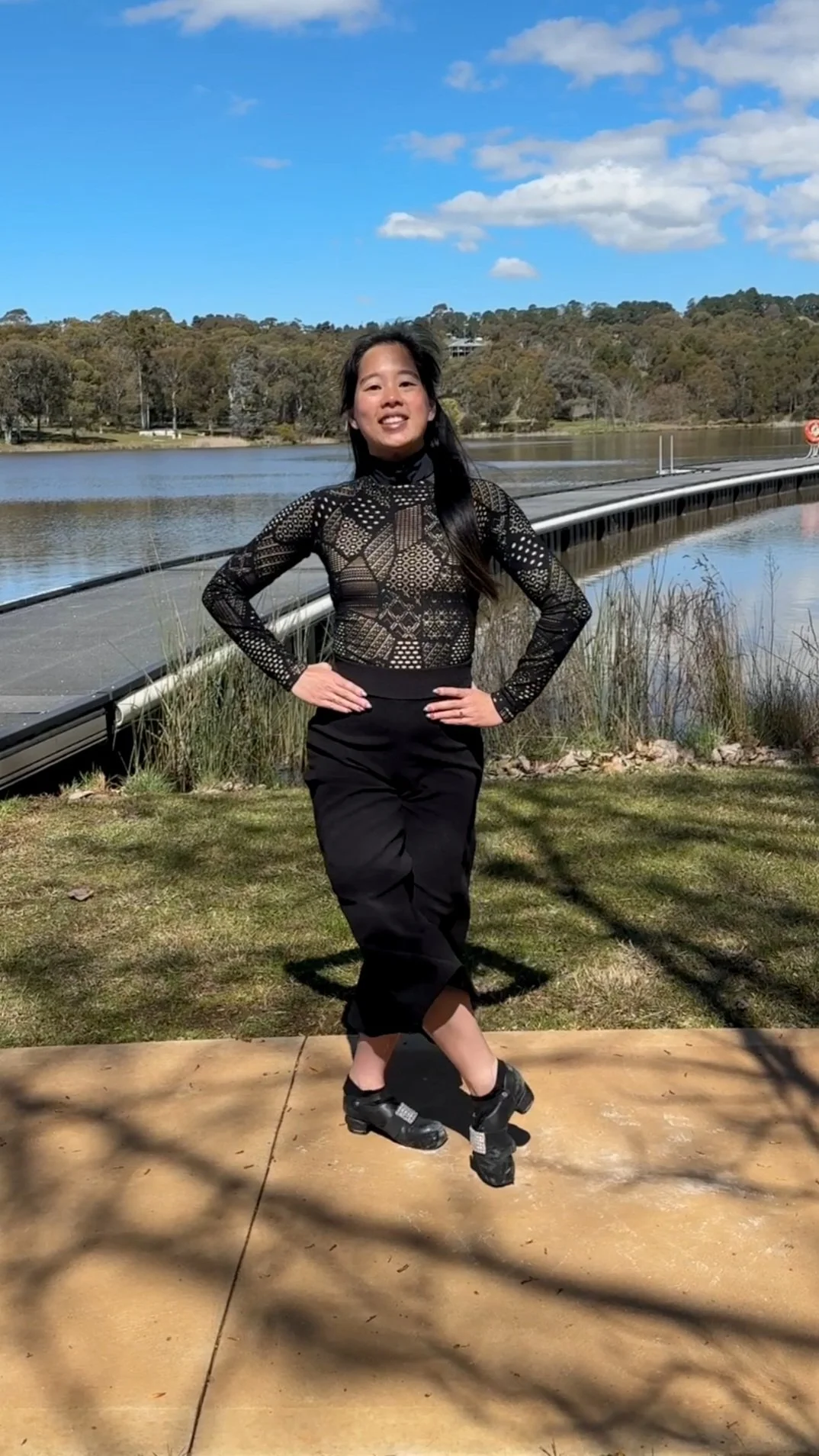 Founder and principal teacher of Orange Academy of Irish Dance performing an Irish dance pose at the lake in Orange, NSW 2800.