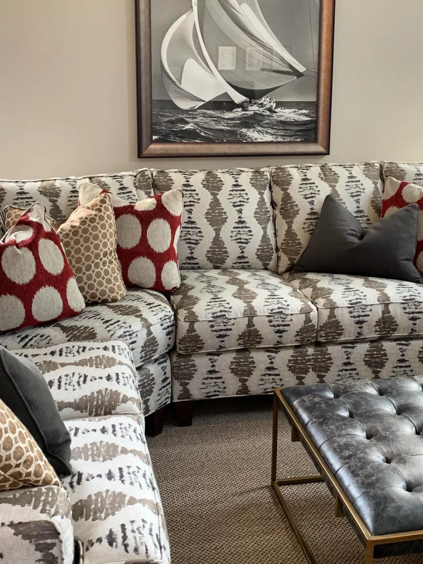 Not every sectional has to be neutral.
A patterned foundation can bring depth and movement to a space, especially when paired with a restrained palette. The key is balance&mdash;let the upholstery carry interest while accents add contrast.
Design sho