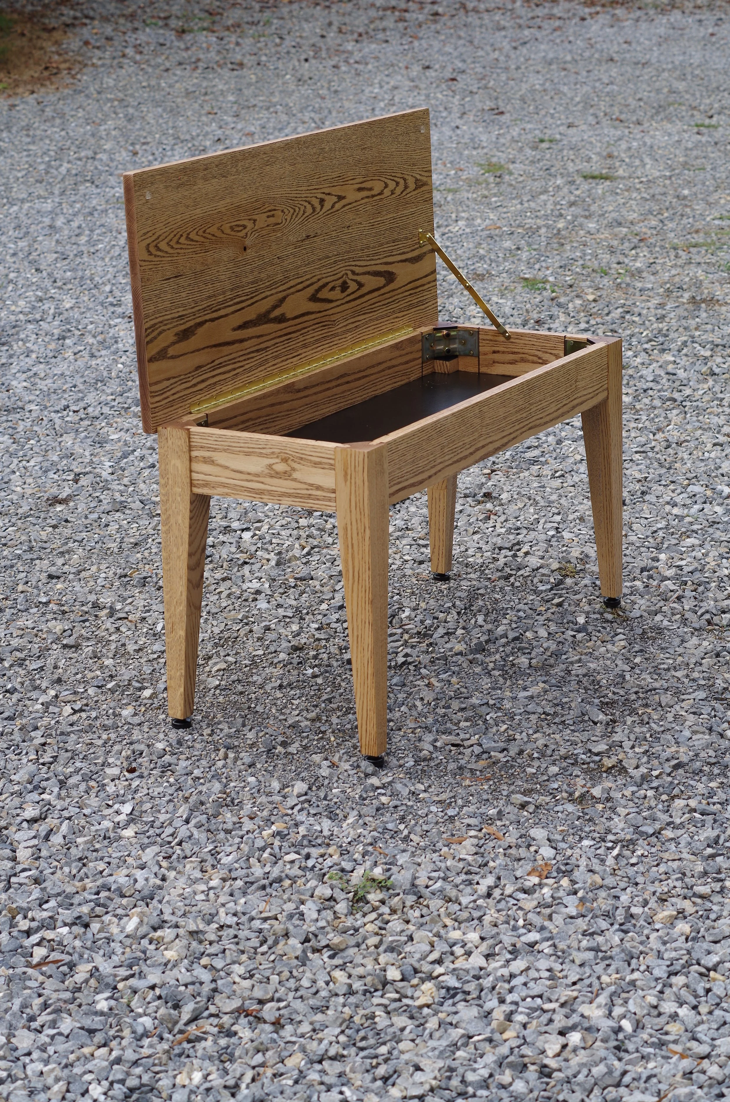 Solid Oak Piano bench.