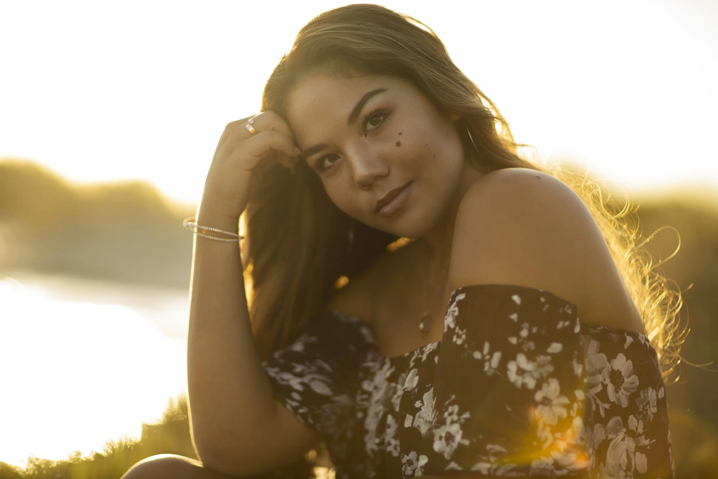 Golden hour outdoor portrait of a woman photographed in natural light by an Oahu portrait photographer