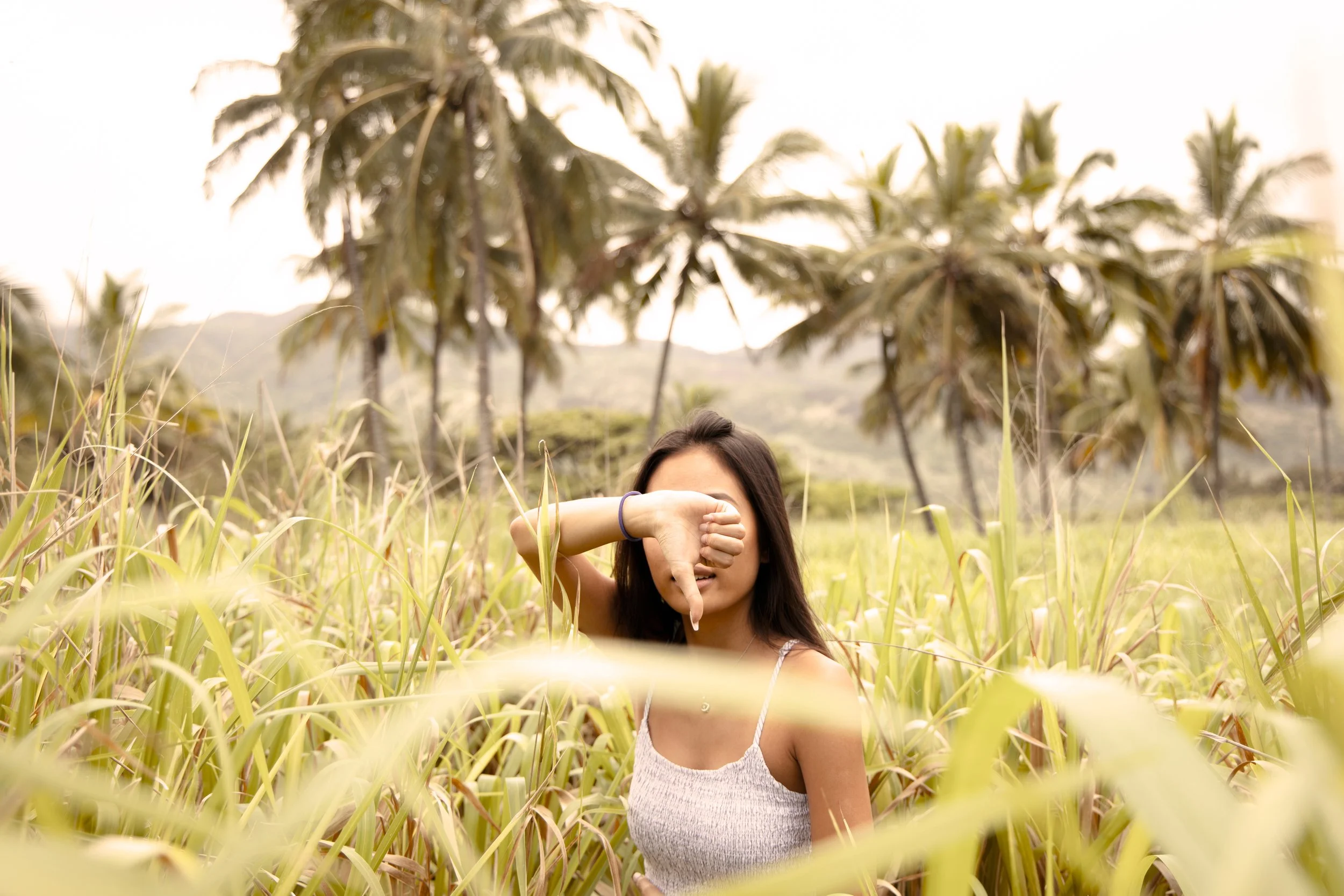 Women’s graduation portrait photographed outdoors with soft natural light