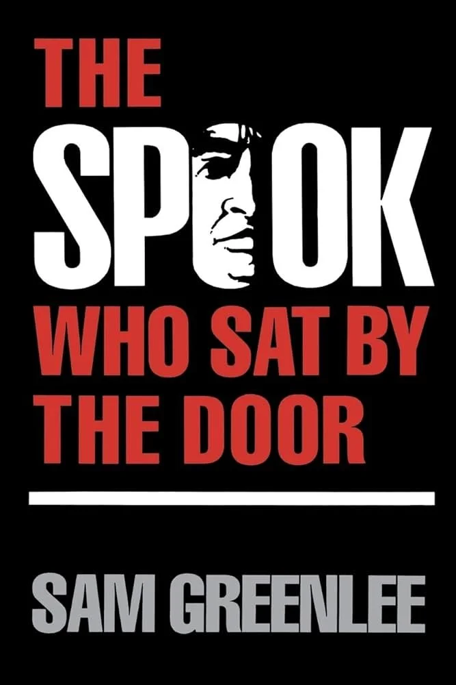 Book cover for 'The Spook Who Sat by the Door' by Sam Greenlee with black background, title in large white and red text, and an illustration of a woman's face silhouette in black and white.