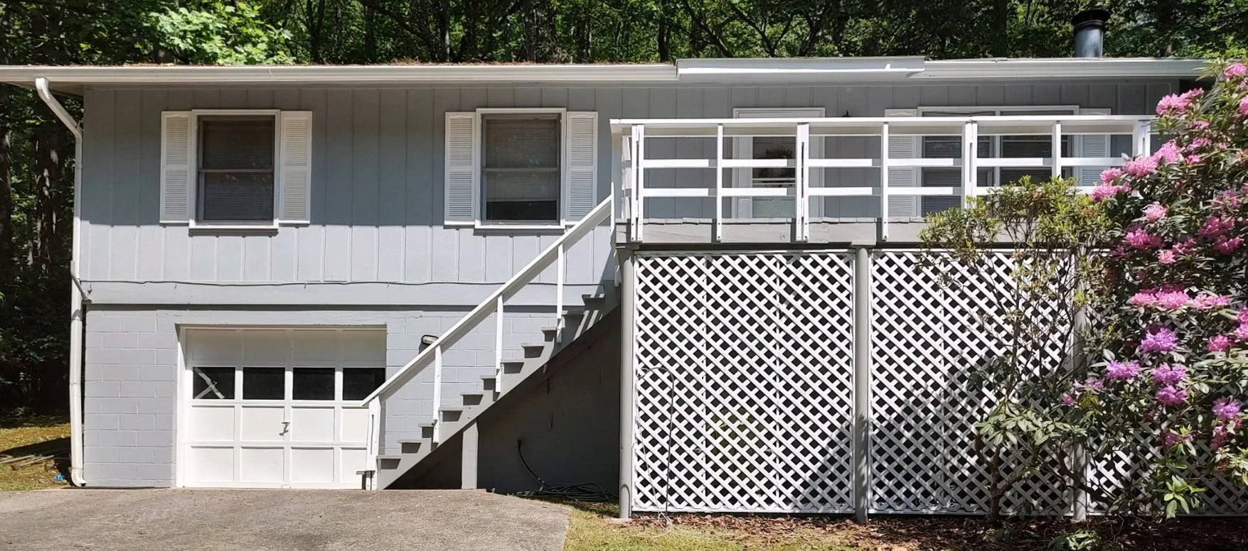 Washed and painted siding, trim, shutters, garage door, lattice, deck — the whole shebang! Otto, NC