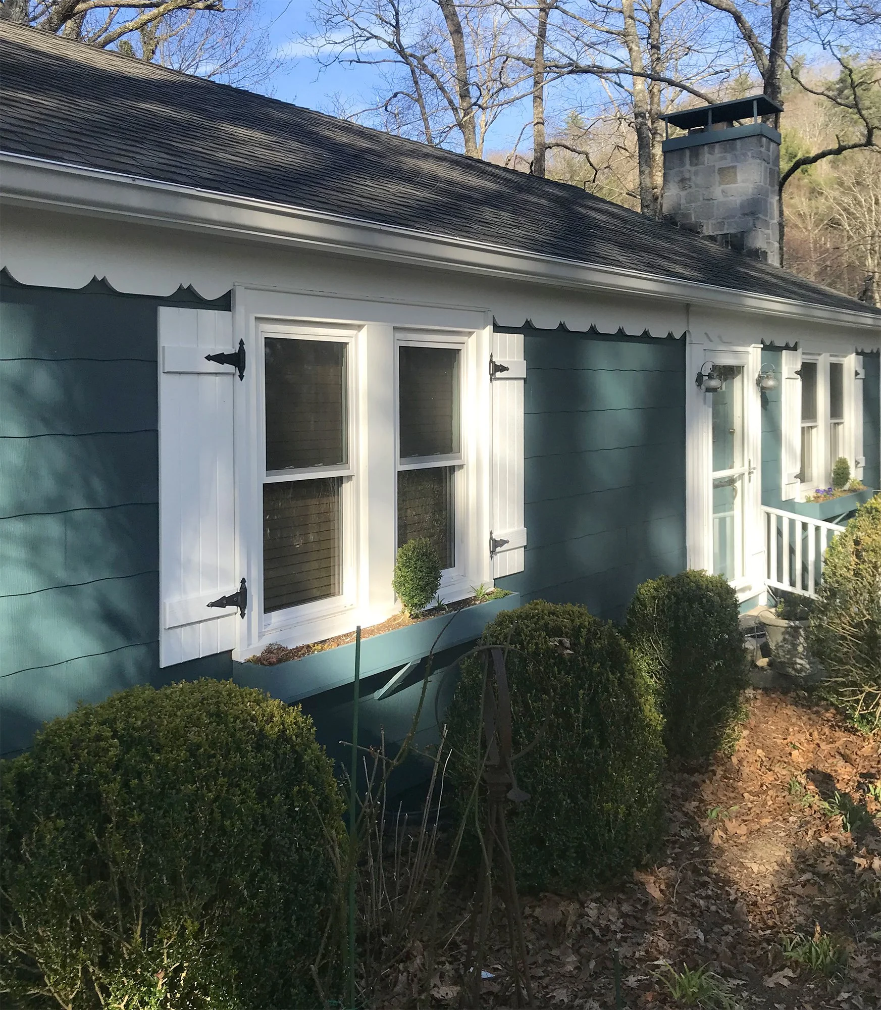 Soft-washed and painted siding & trim to the owners' choice of colors. The teal color was a nice deviation from the other houses in this Highlands neighborhood.