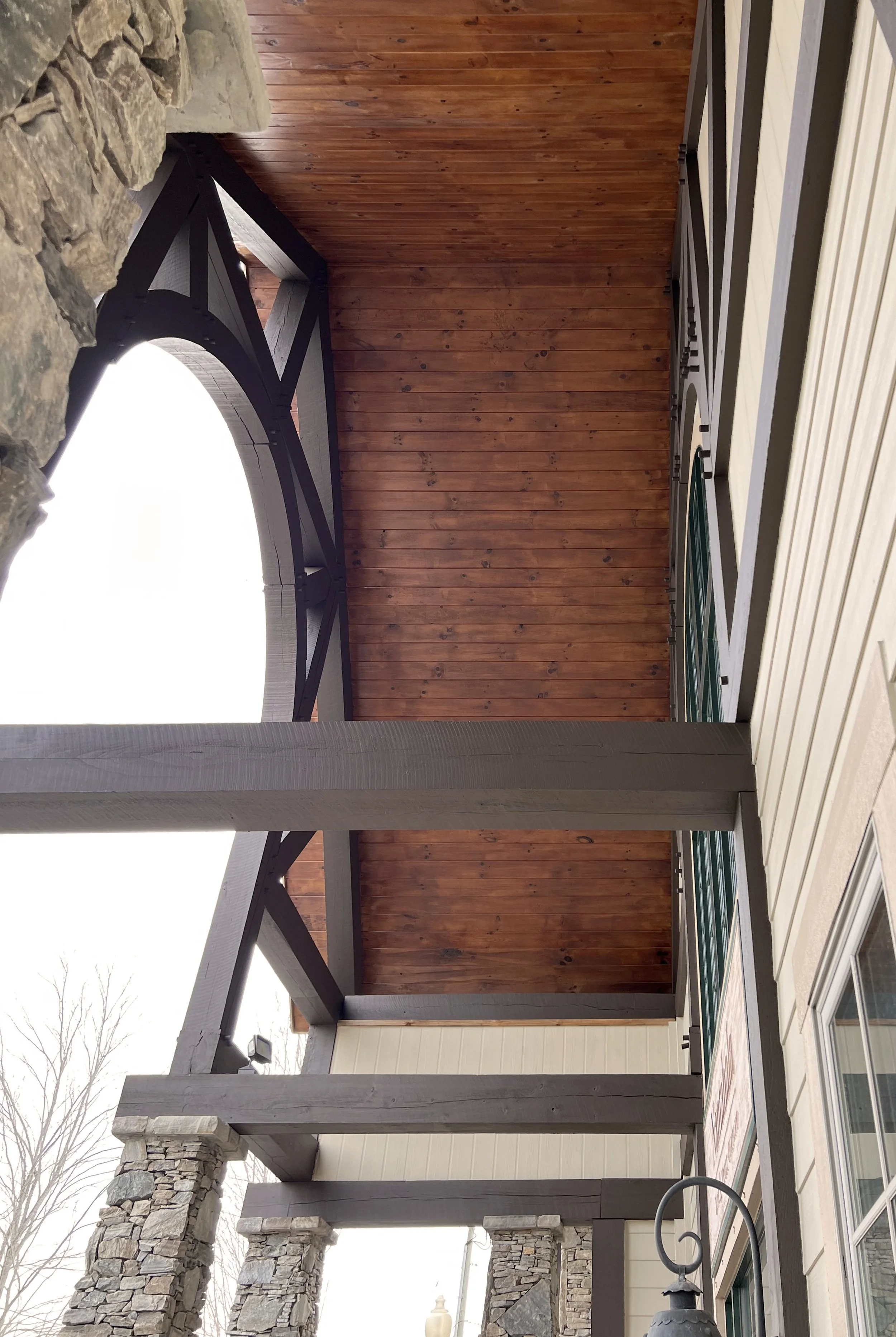 Sharp's Painting, LLC, WNC: stained ceiling of vaulted entry roof