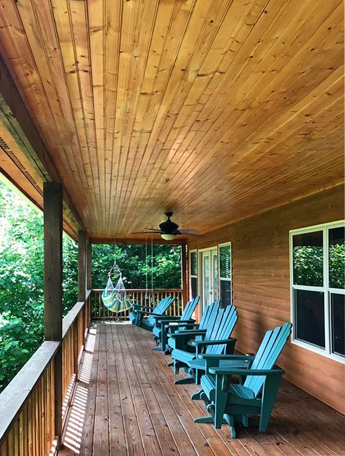 Pressure washed and stained the siding, deck, ceiling and railing.