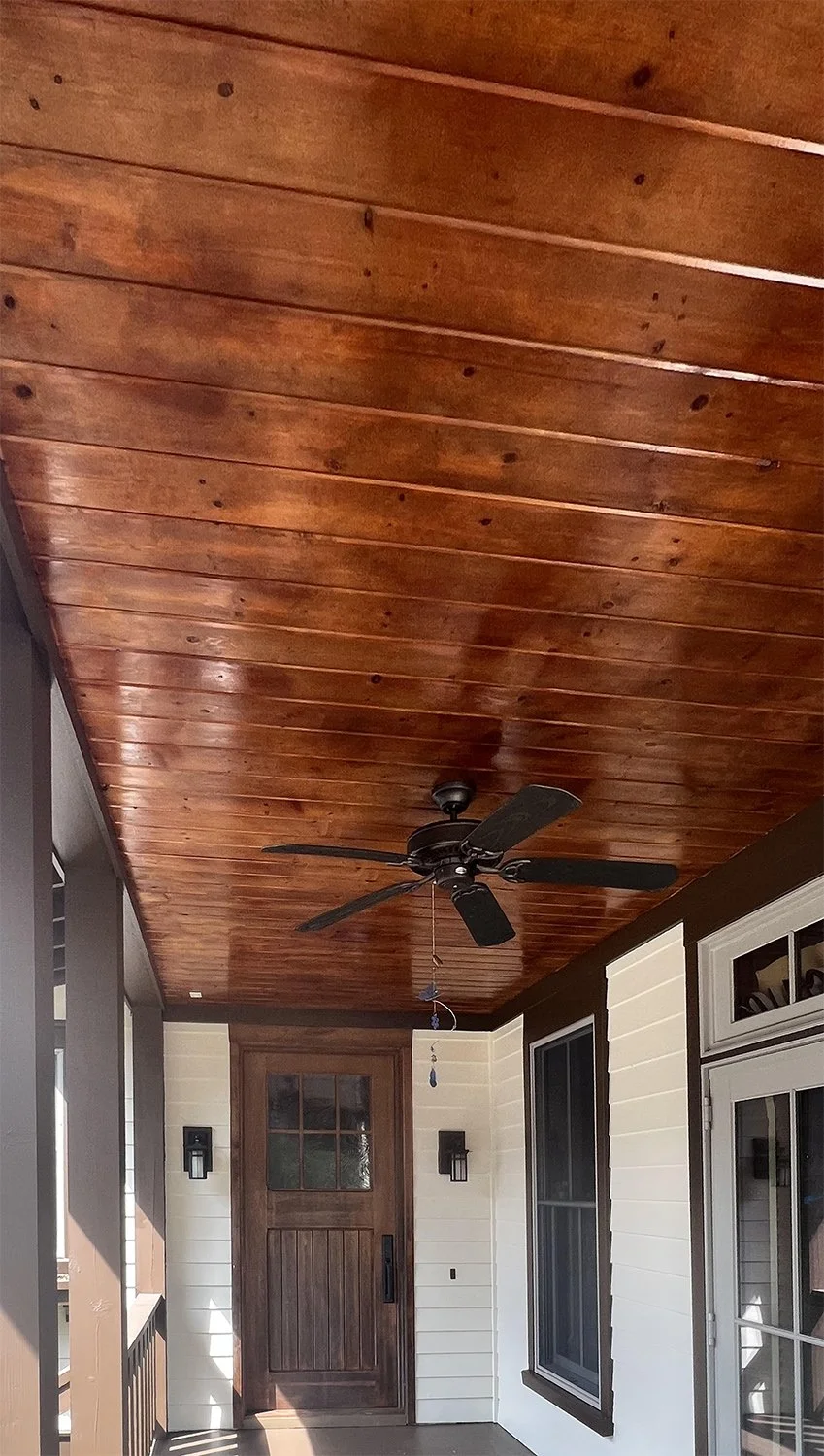 entry after painting siding and trim and staining ceiling