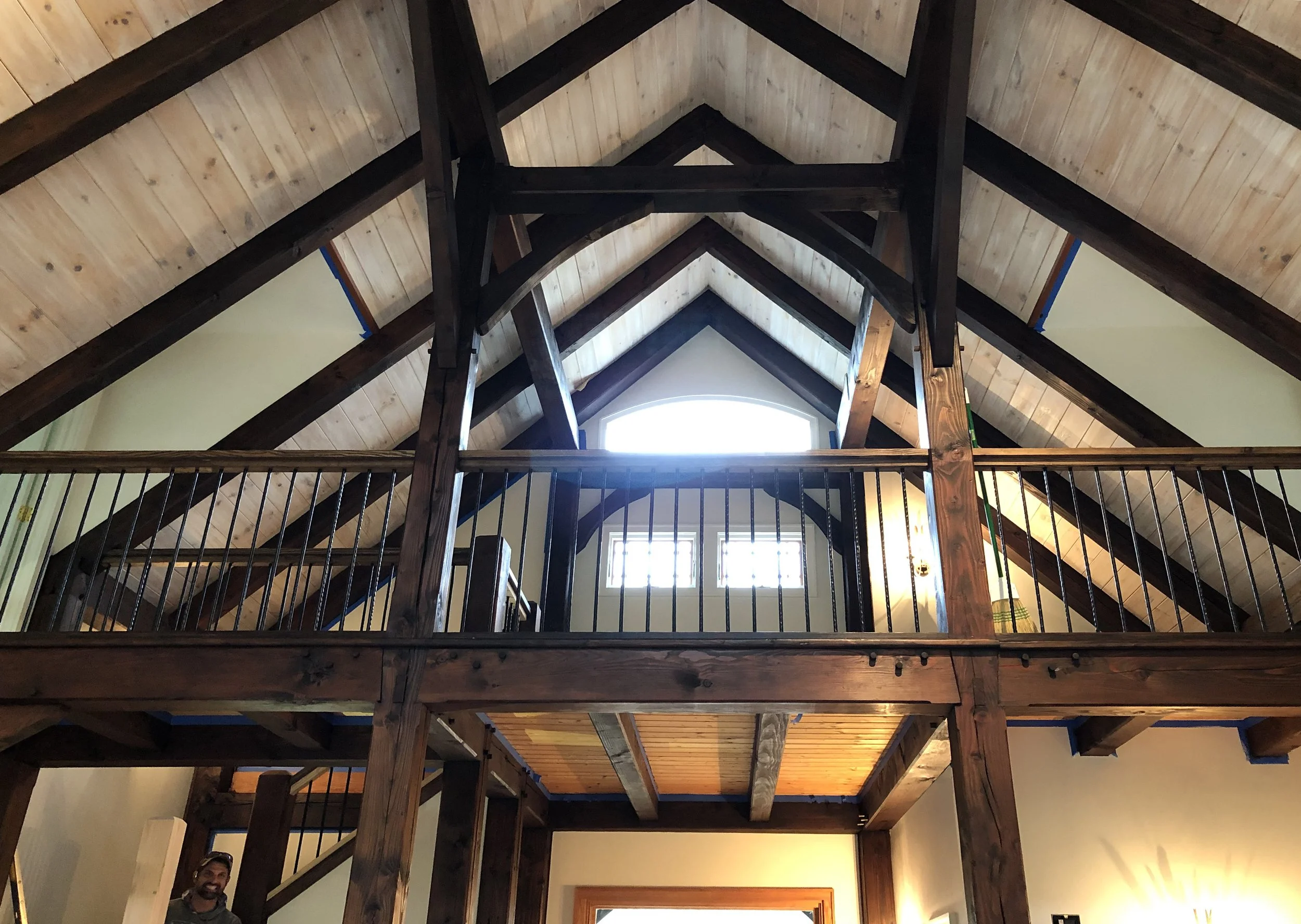 post-and-beam loft in large living area in a home