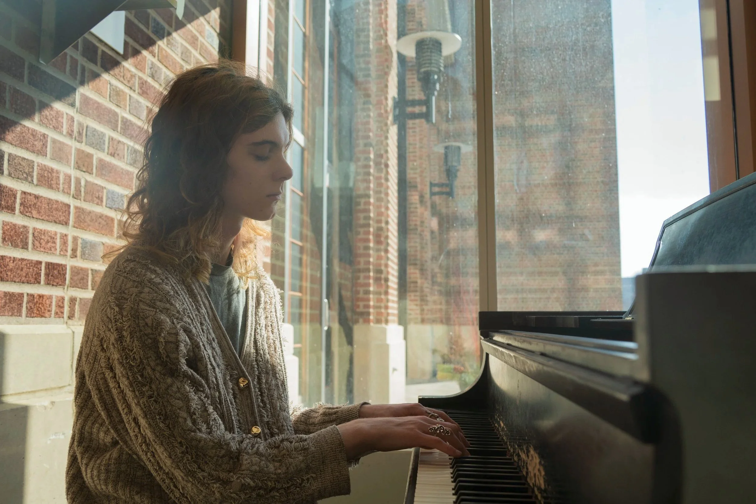Nursing student and pianist Allie Gilbert plays the piano at Coffman Memorial Union at the University of Minnesota in Minneapolis, Minn. on Feb. 26, 2026. Gilbert said the first instrument she learned was the cello, but she prefers the piano because 