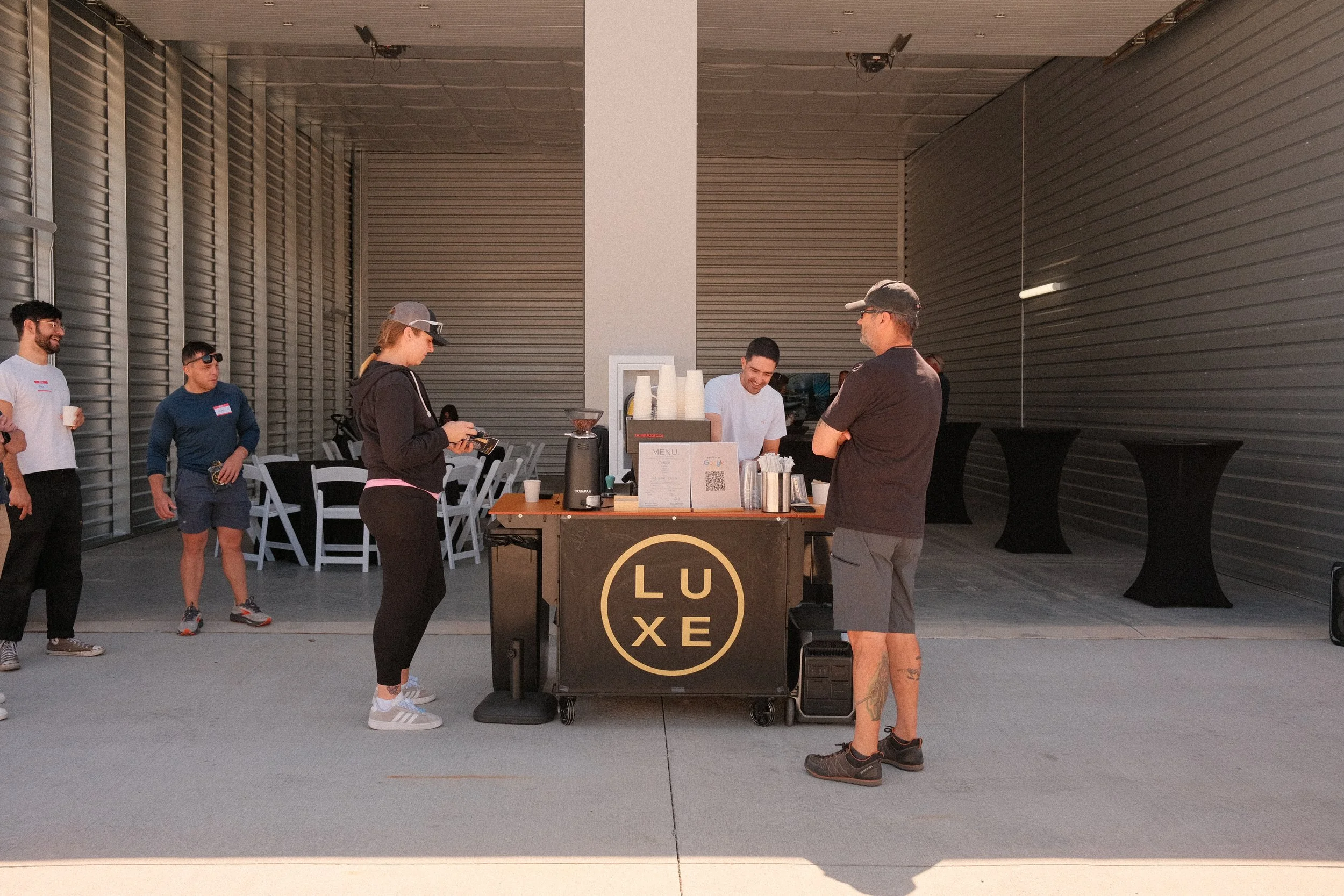 Serving espresso based drinks for customers. Brand integration - Luxelocker