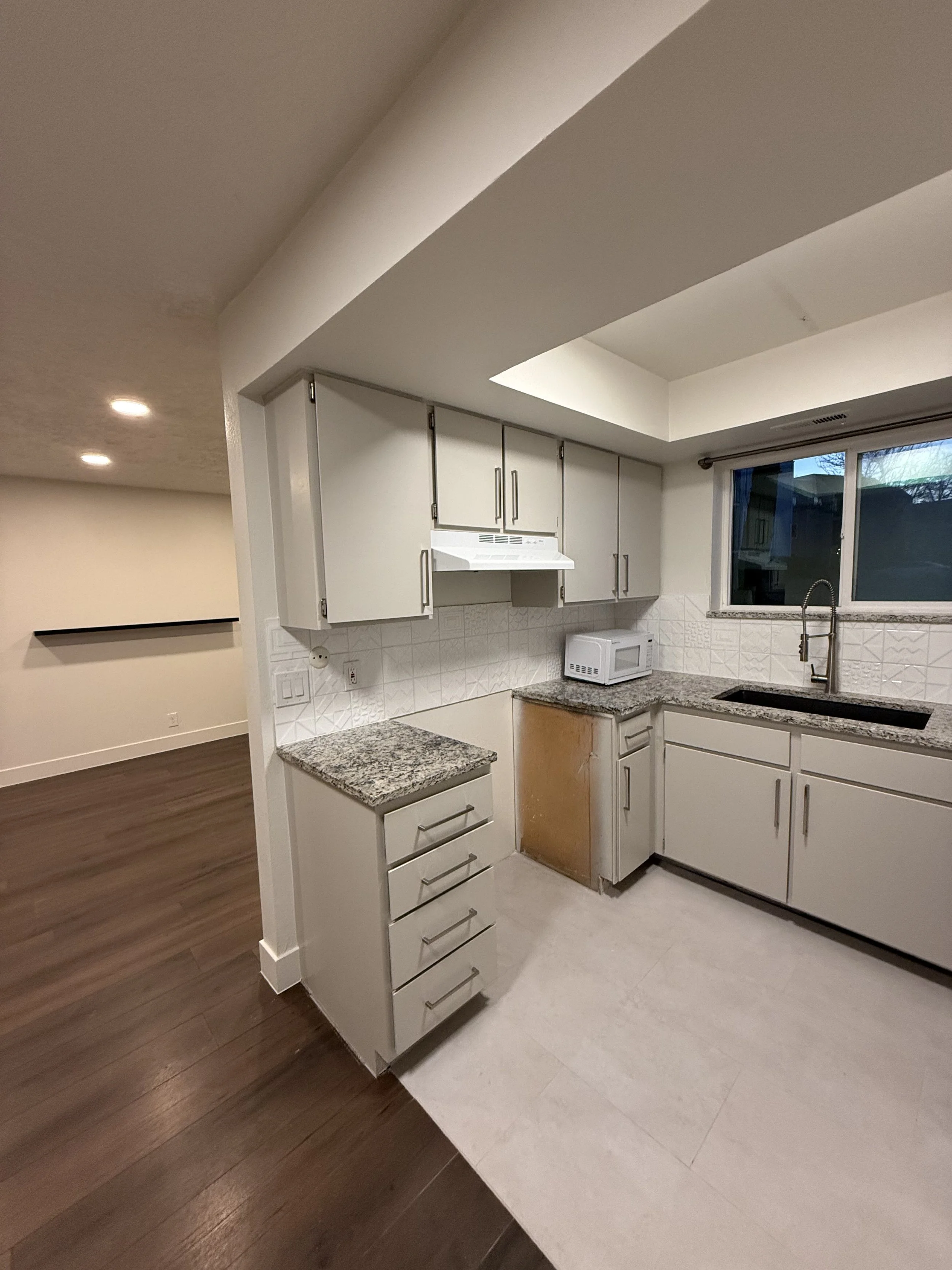 second kitchen, cabinets, painting, electrical and flooring