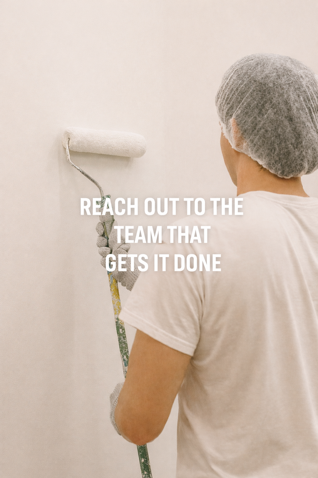 Person wearing a hairnet and gloves painting a wall with a paint roller, with the text 'Reach out to the team that gets it done' overlaid.
