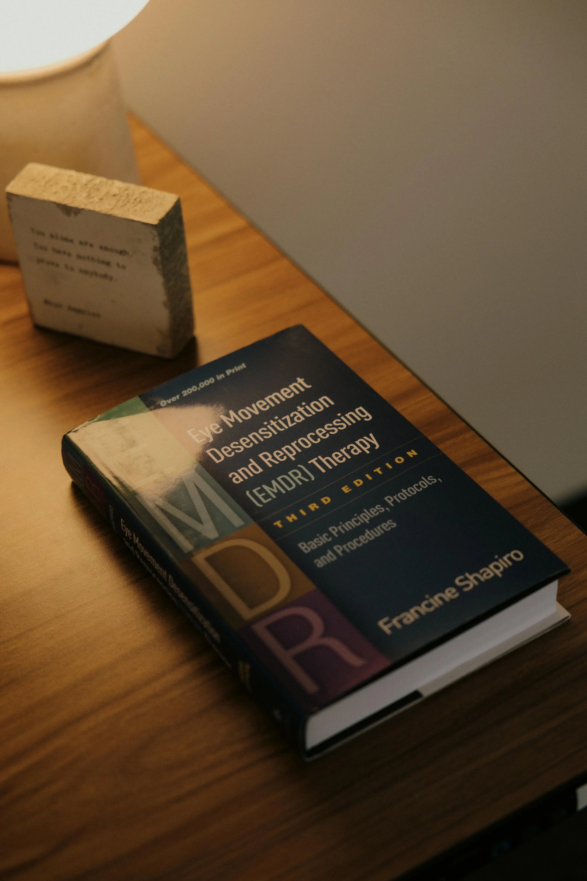 EMDR Book sitting on desk in therapy office