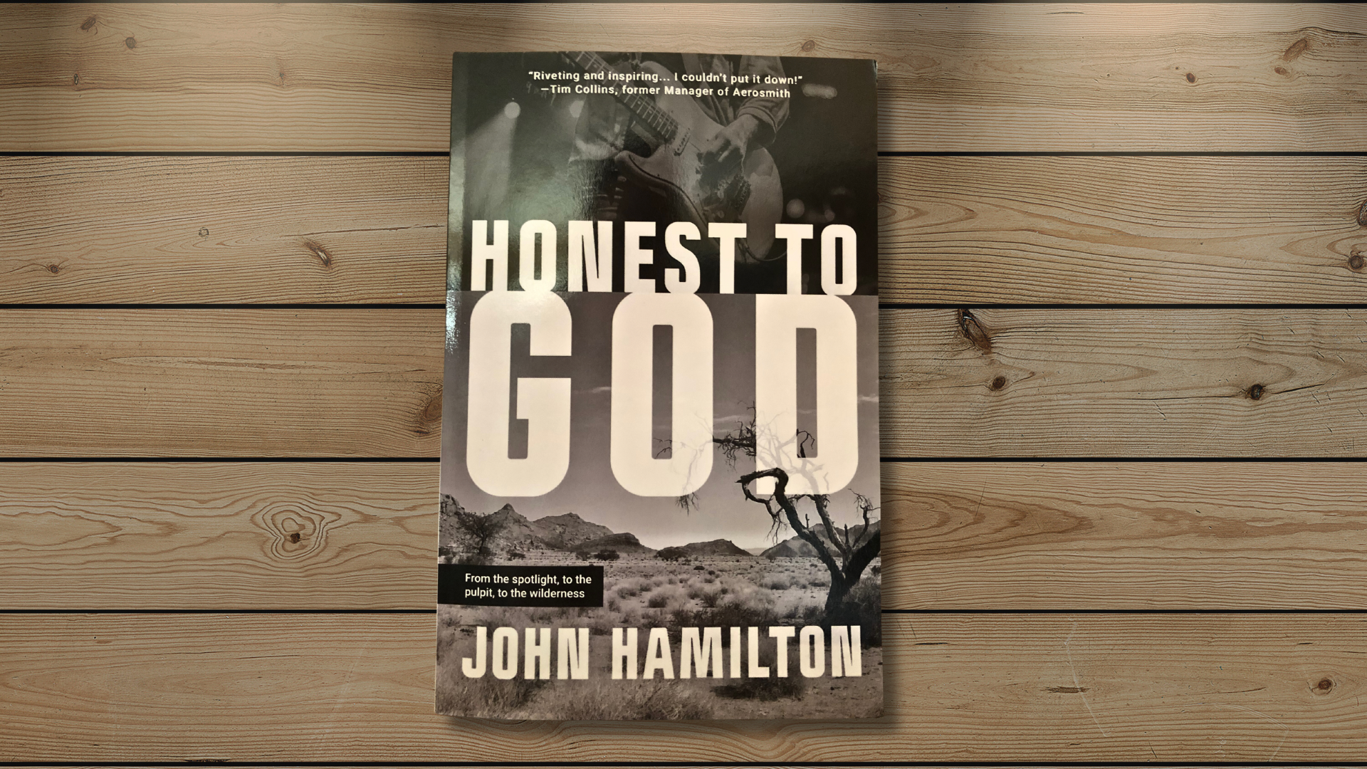 Book cover of "Honest to God" by John Hamilton. Background is wood floor slats.