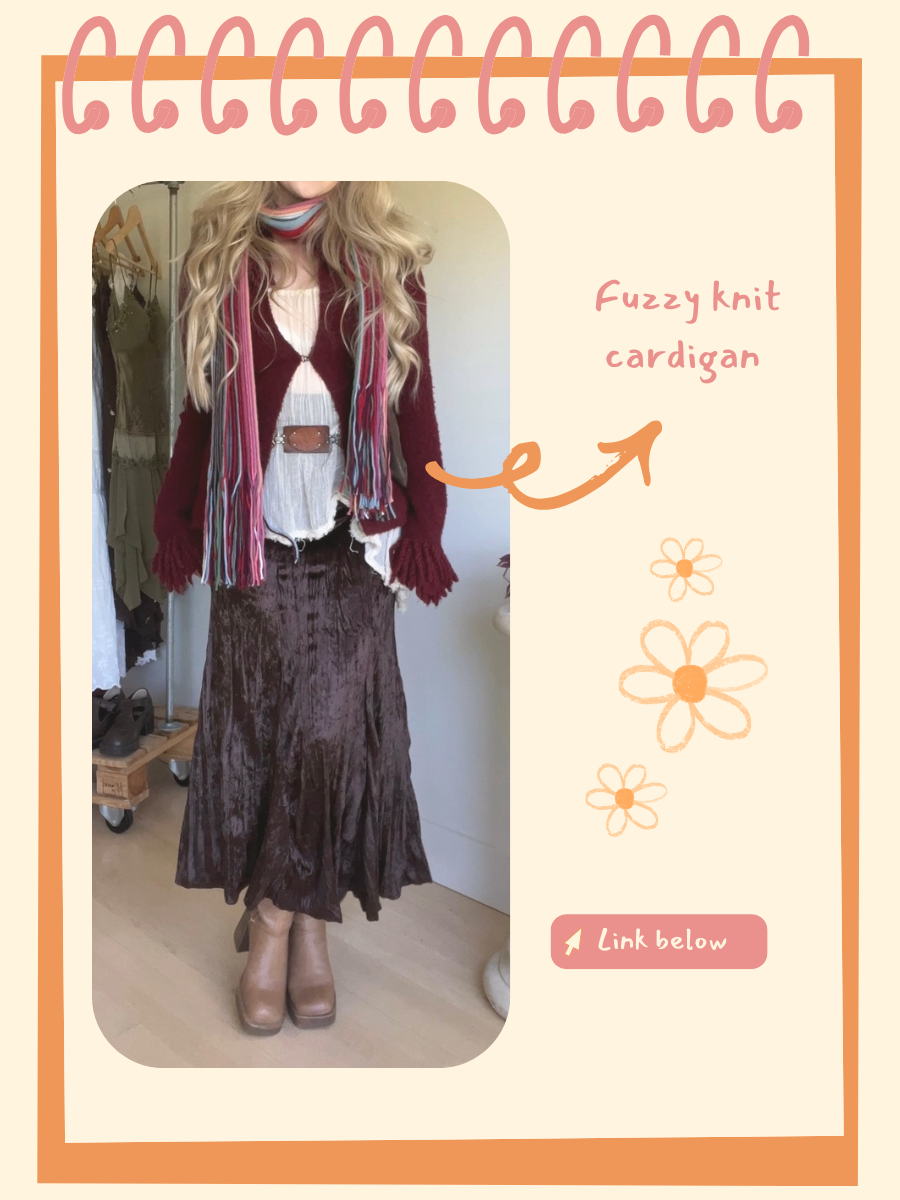 A woman wearing a vintage maxi dress with a brown jacket, tan boots, and a belt, standing indoors with a clothing rack in the background.