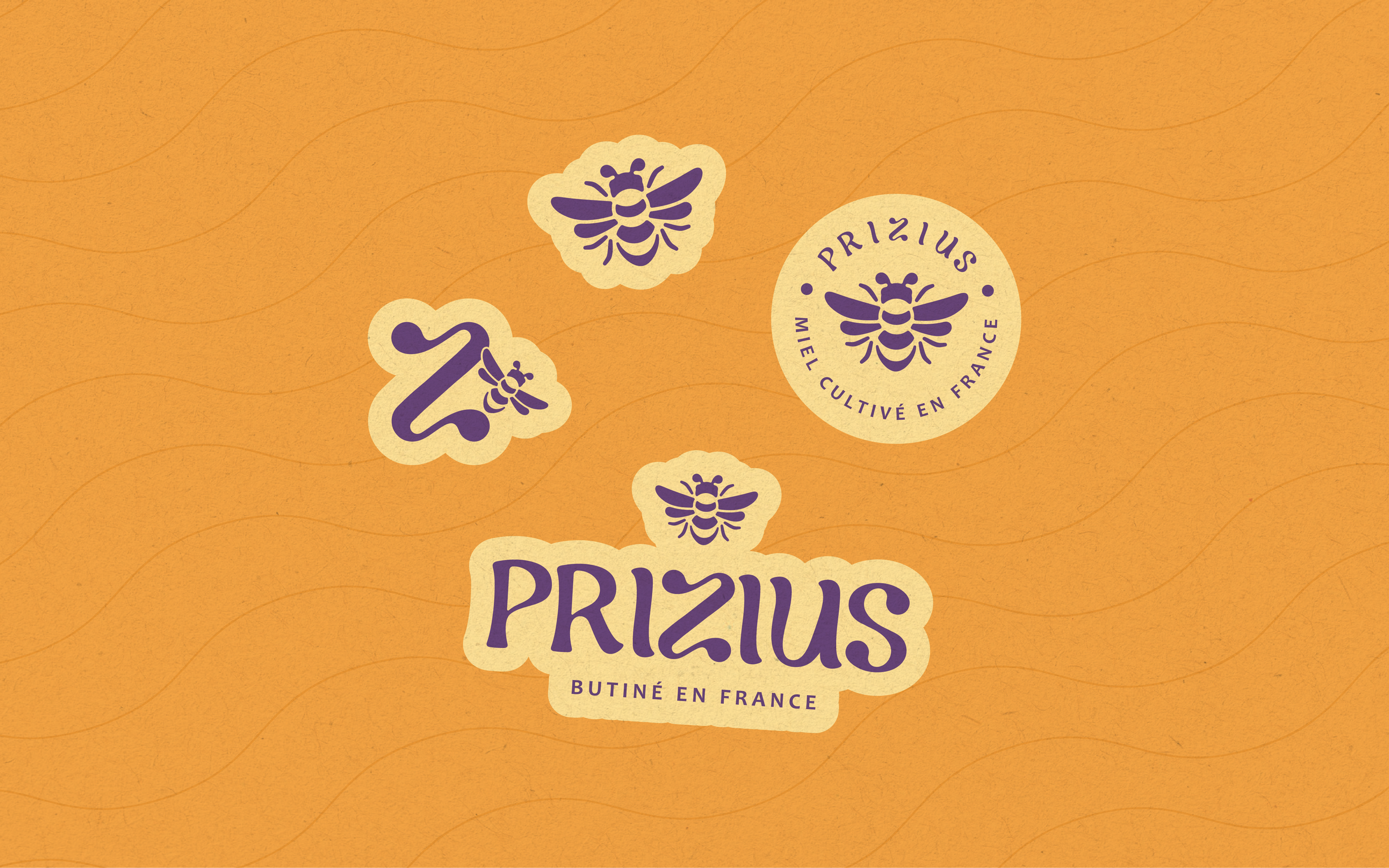 Étiquette de fromage au beurre en France, contenant un logo de abeille, avec le mot 'PRIZIUS' en violet sur un fond orange.