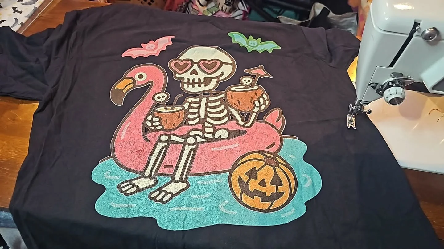 Working some upcycle magic on this summerween t shirt! Its going to make the best tote ✨️🌴💀