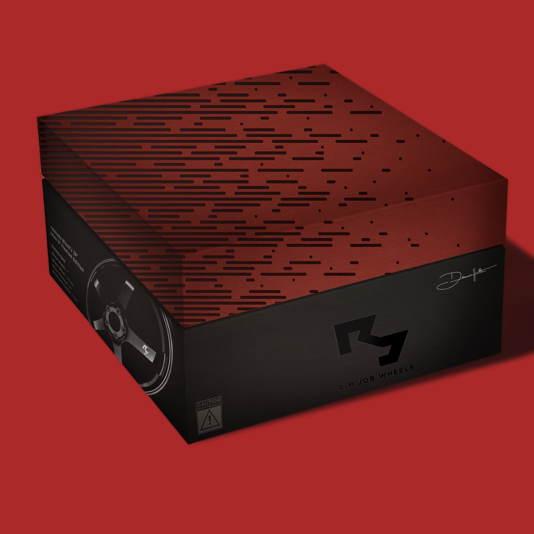 Black and red box packaging for Rim Job Wheels, featuring an abstract wheel graphic and signature, set against a red background.