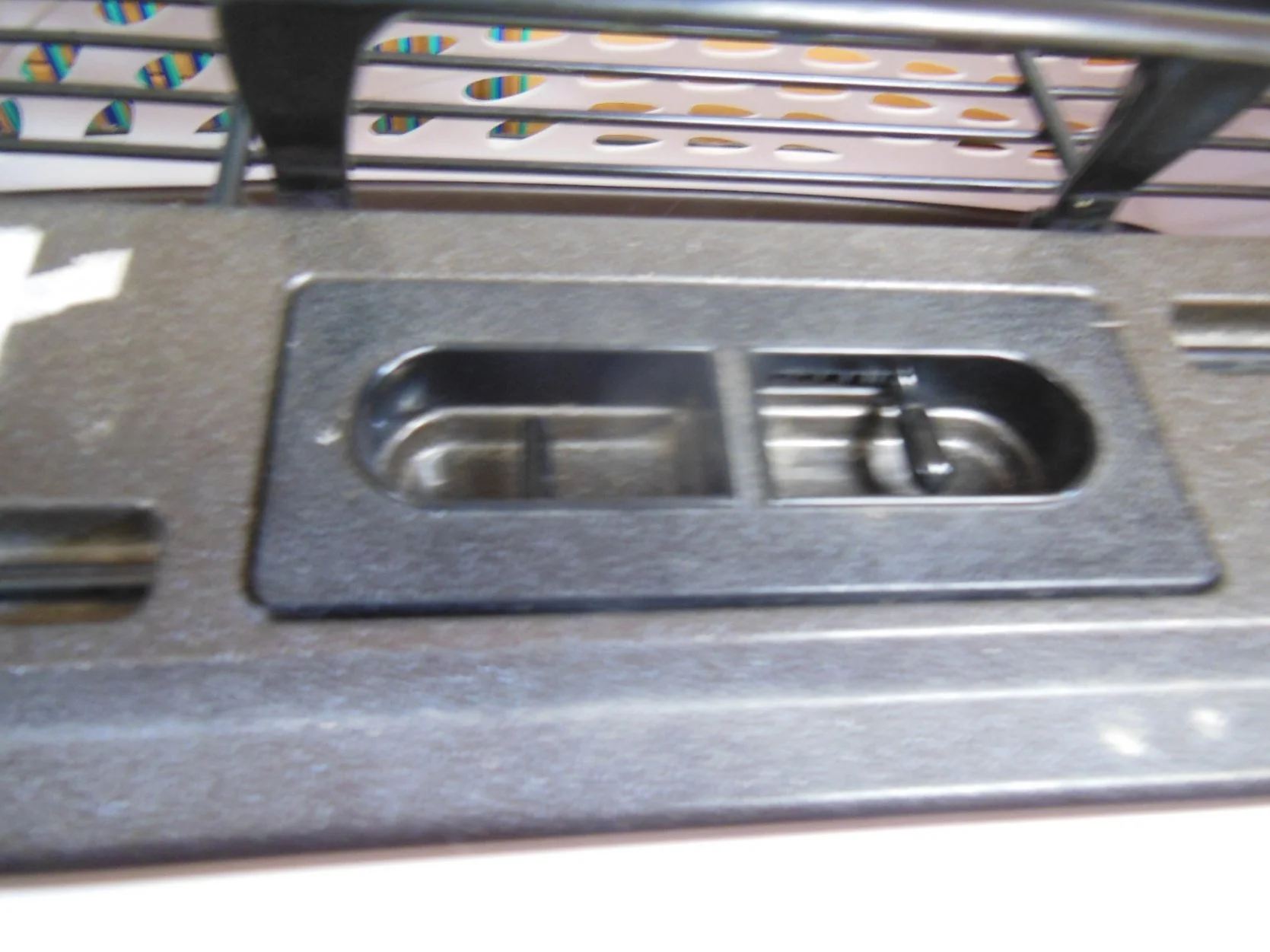 Close-up view of  how to lock and uplock  carrier