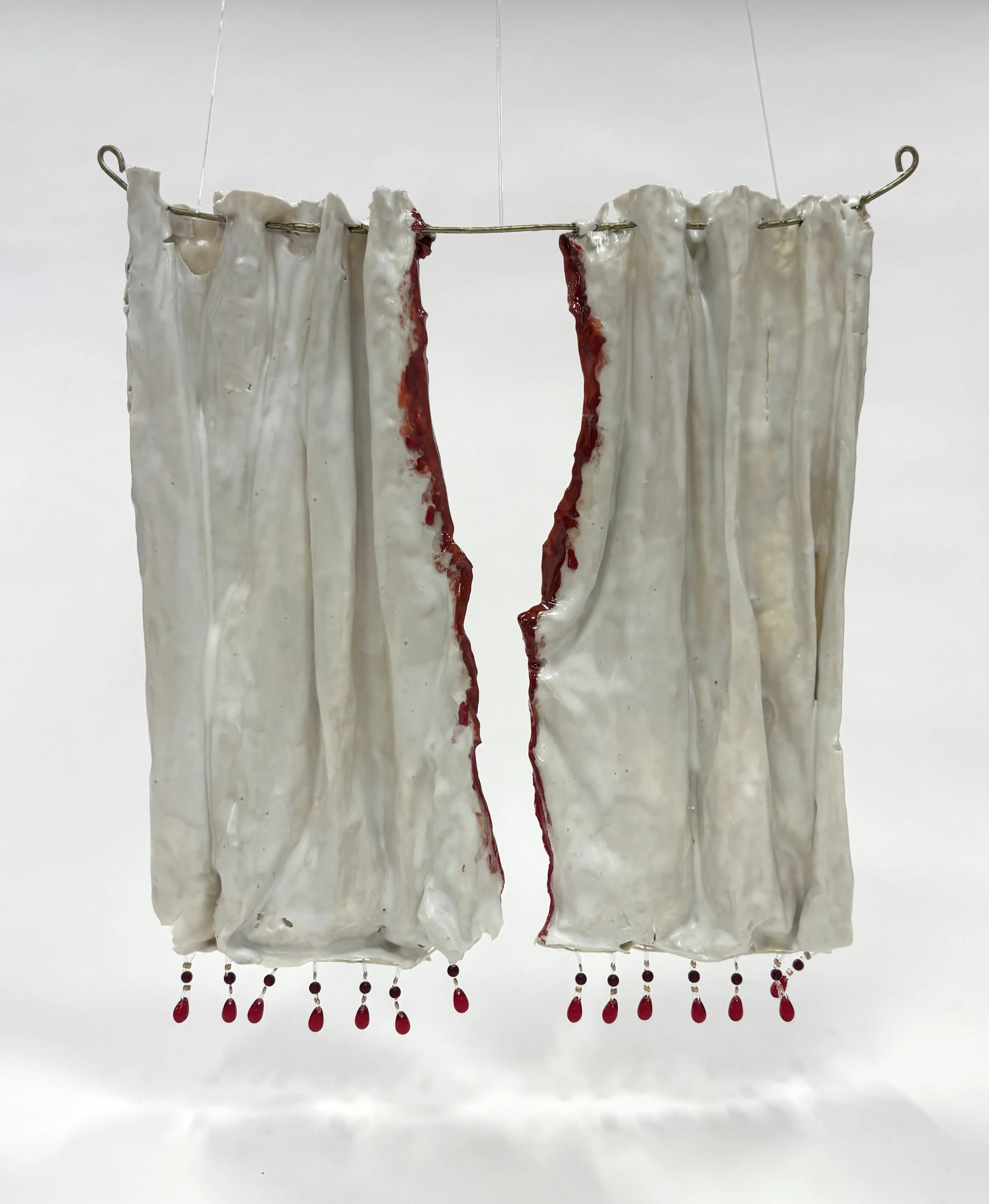 "It is Finished," 2025, ceramic, high-temperature wire, glass beads