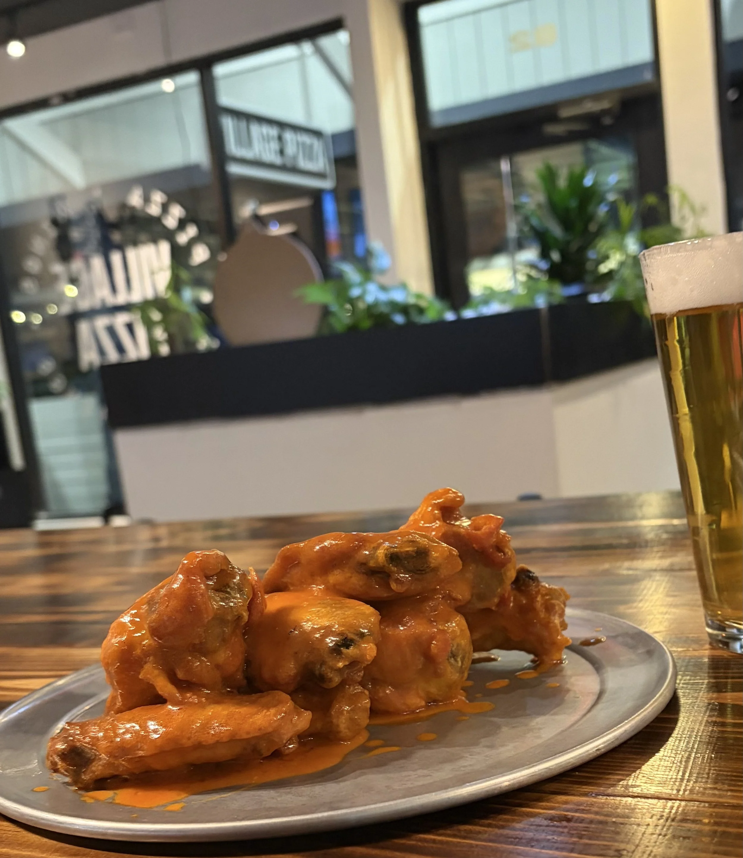 Buffalo wings and beer at Village Pizza Nags Head NC