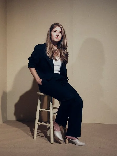 Jamie Boyle seated in her Tribeca premiere look