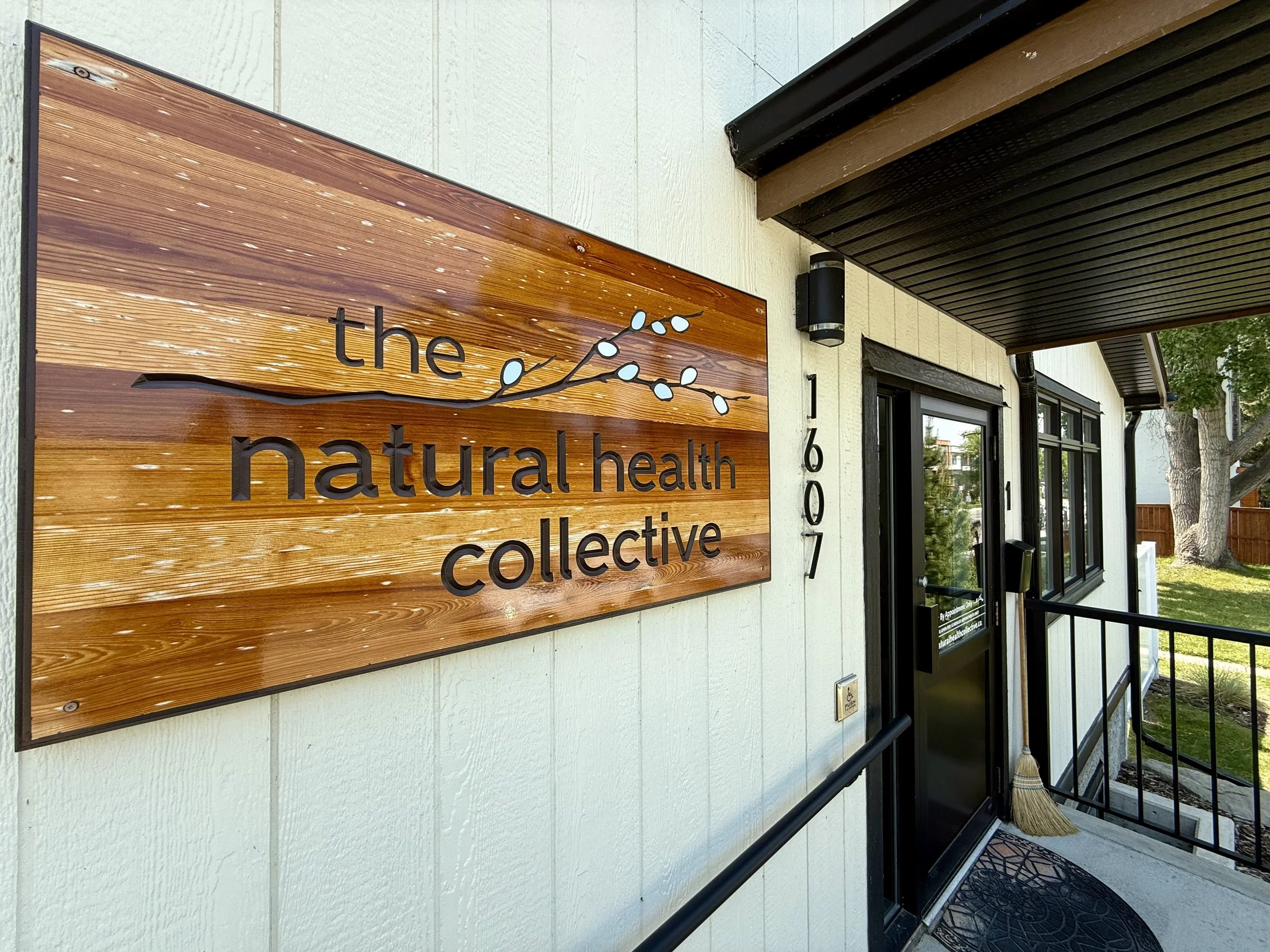 Food sign and front door of The Natrual Health Collective.