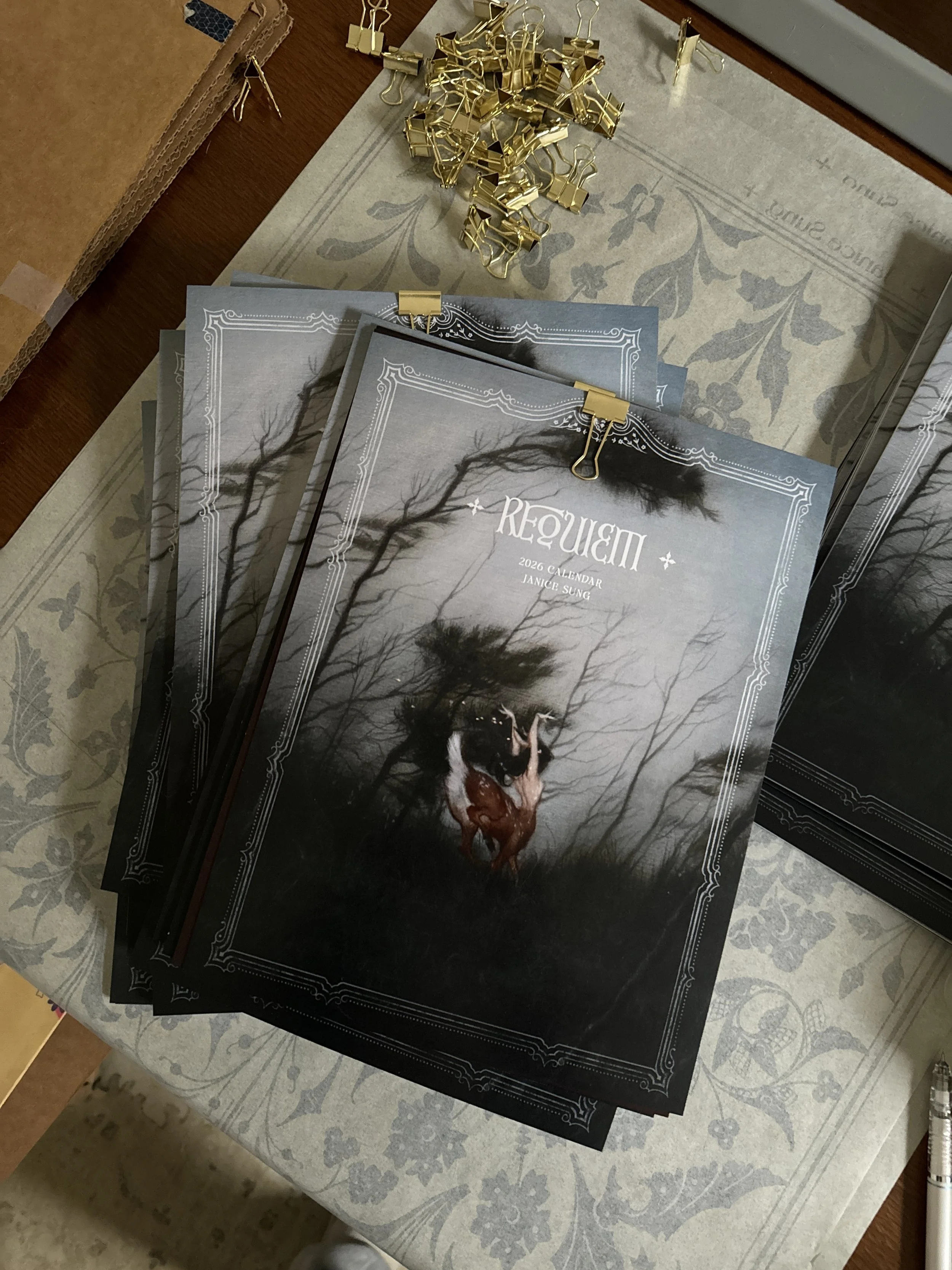 a 2026 calendar by Janice Sung featuring themes of romantic fantasy oil paintings.