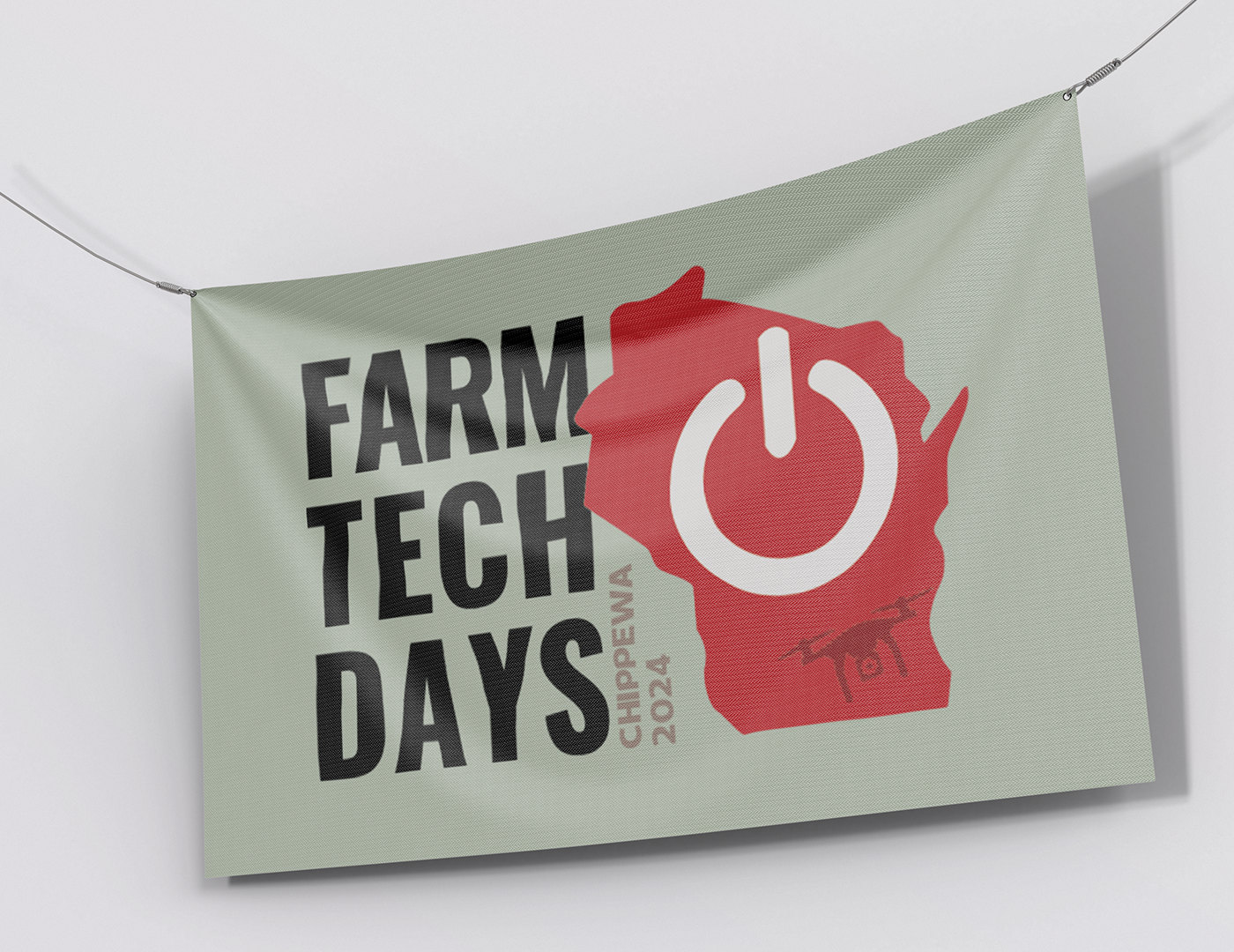 Banner for Farm Tech Days Chippewa 2024 showing a red outline map of Wisconsin with a white power button inside and a drone illustration beneath, with event details.