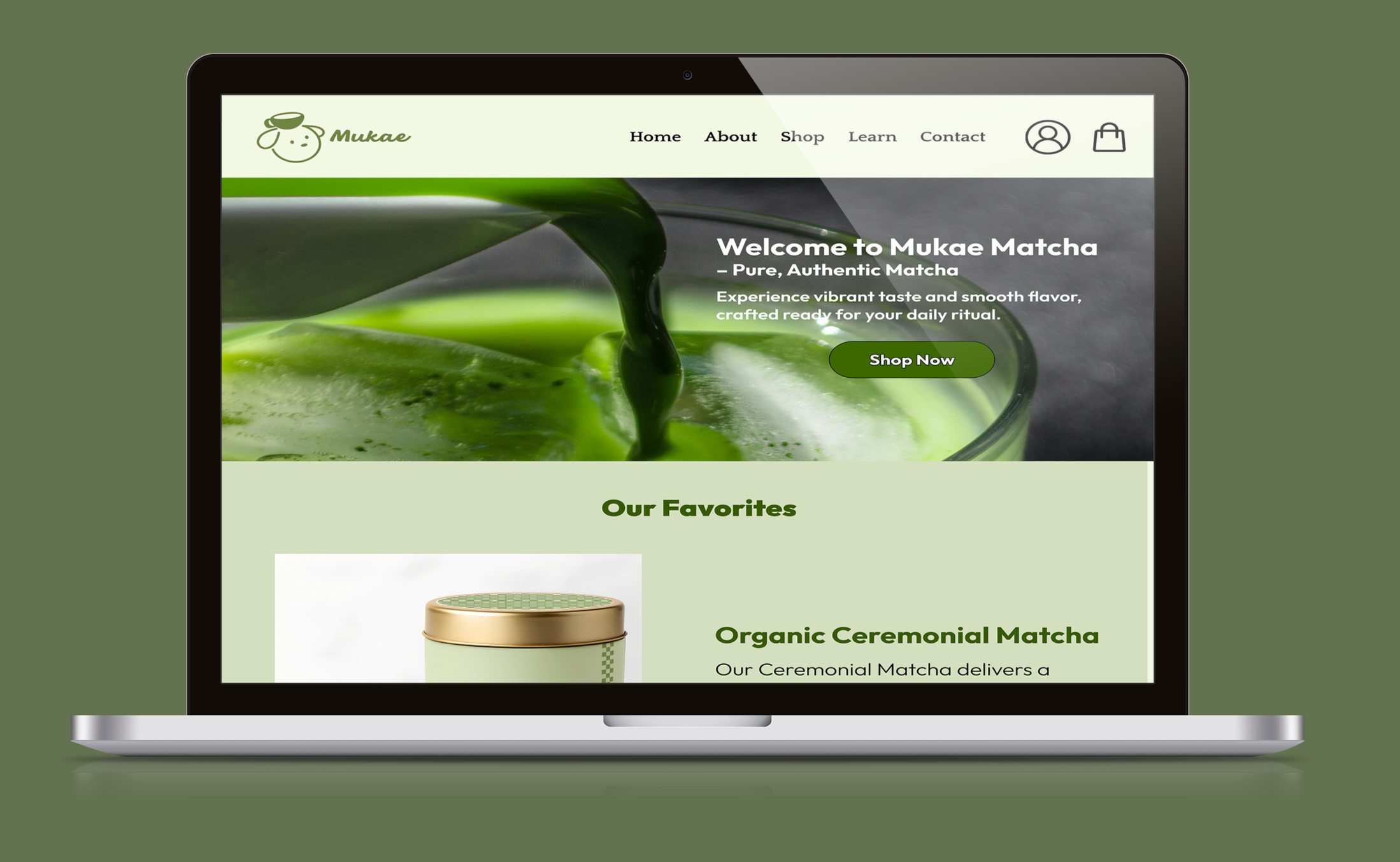 Laptop displaying a website for Mukae, a matcha tea brand, with a green tea pouring into a bowl in the background.