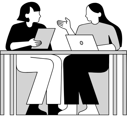 Two people sitting at a table engaged in a discussion, one holding a puzzle piece, with laptops open in front of them, depicted in a black-and-white, minimalist style.