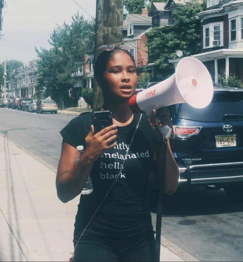 Jasi with bullhorn.jpg