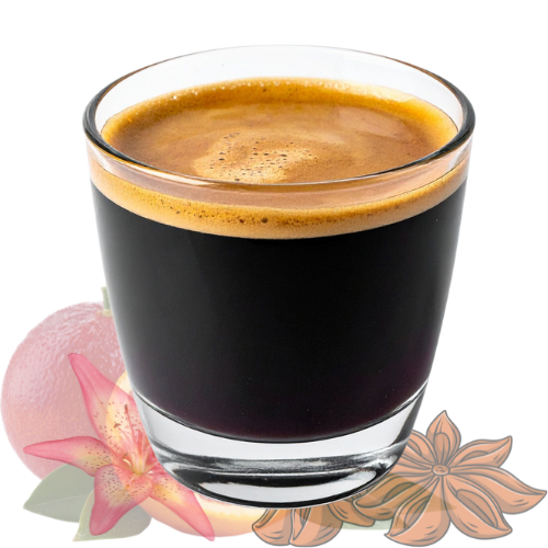 A glass of black coffee with a layer of crema on top, placed next to a red strawberry, pink flower, and brown star anise pods.