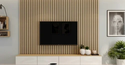 TV mounted on a decorative indoor timber wall