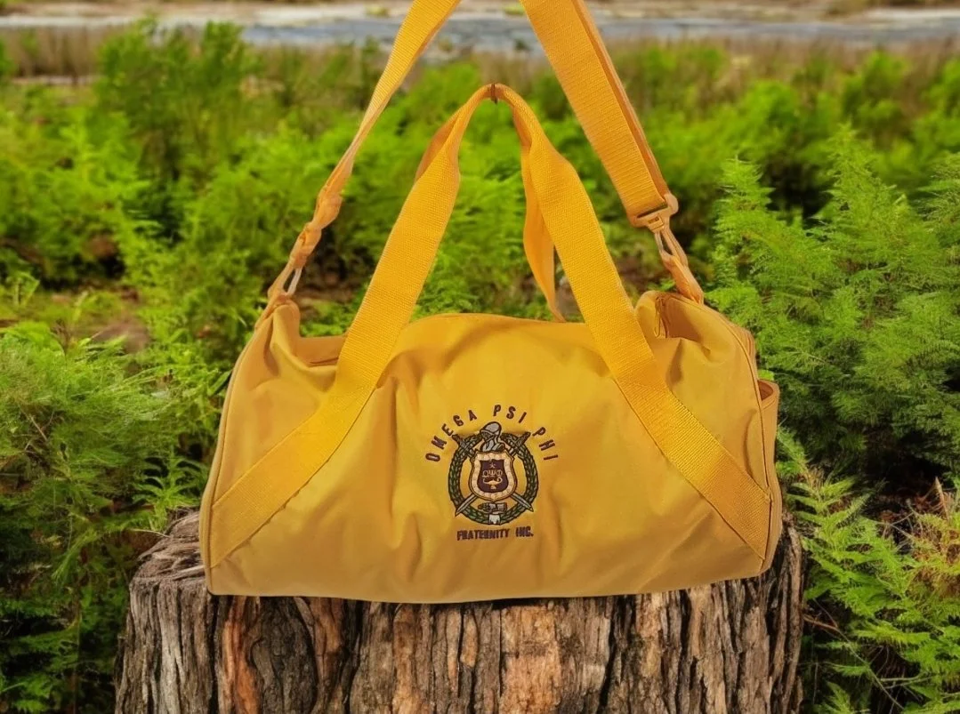 Gold Omega Psi Phi Shield Barrel Duffel Bag