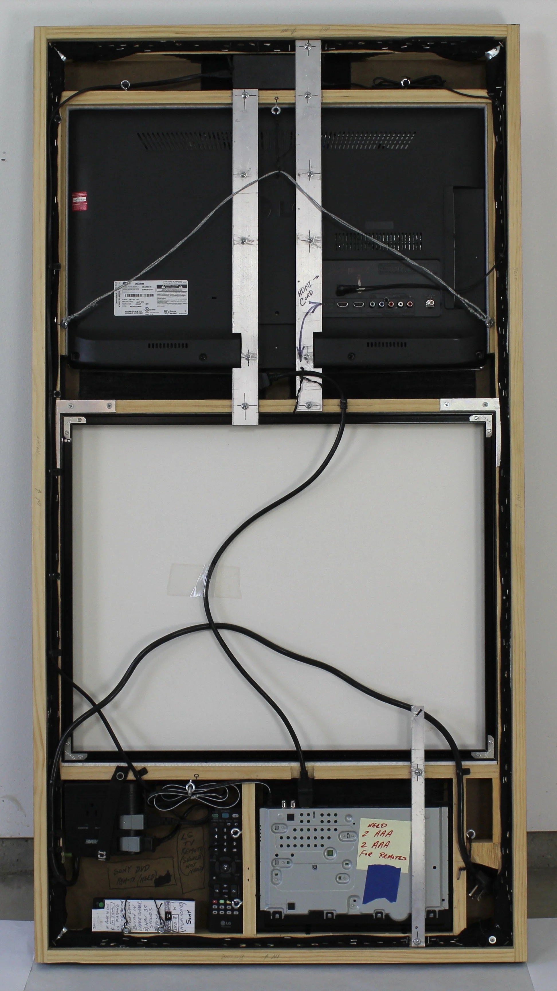 Verso of final panel showing HDTV mount, wiring, and Den Glass.