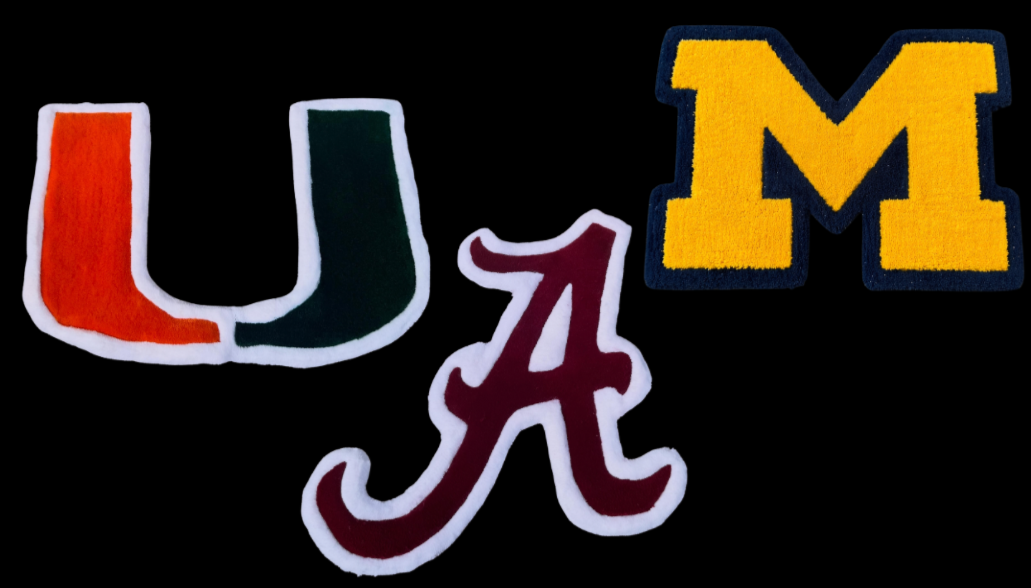 24 inch rugs of the University of Miami 'U' logo, the University of Alabama 'A' logo, and the University of Michigan 'M' logo, on a black background.