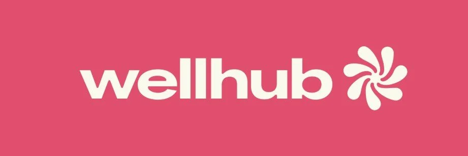 WellHub logo with pink background and white text