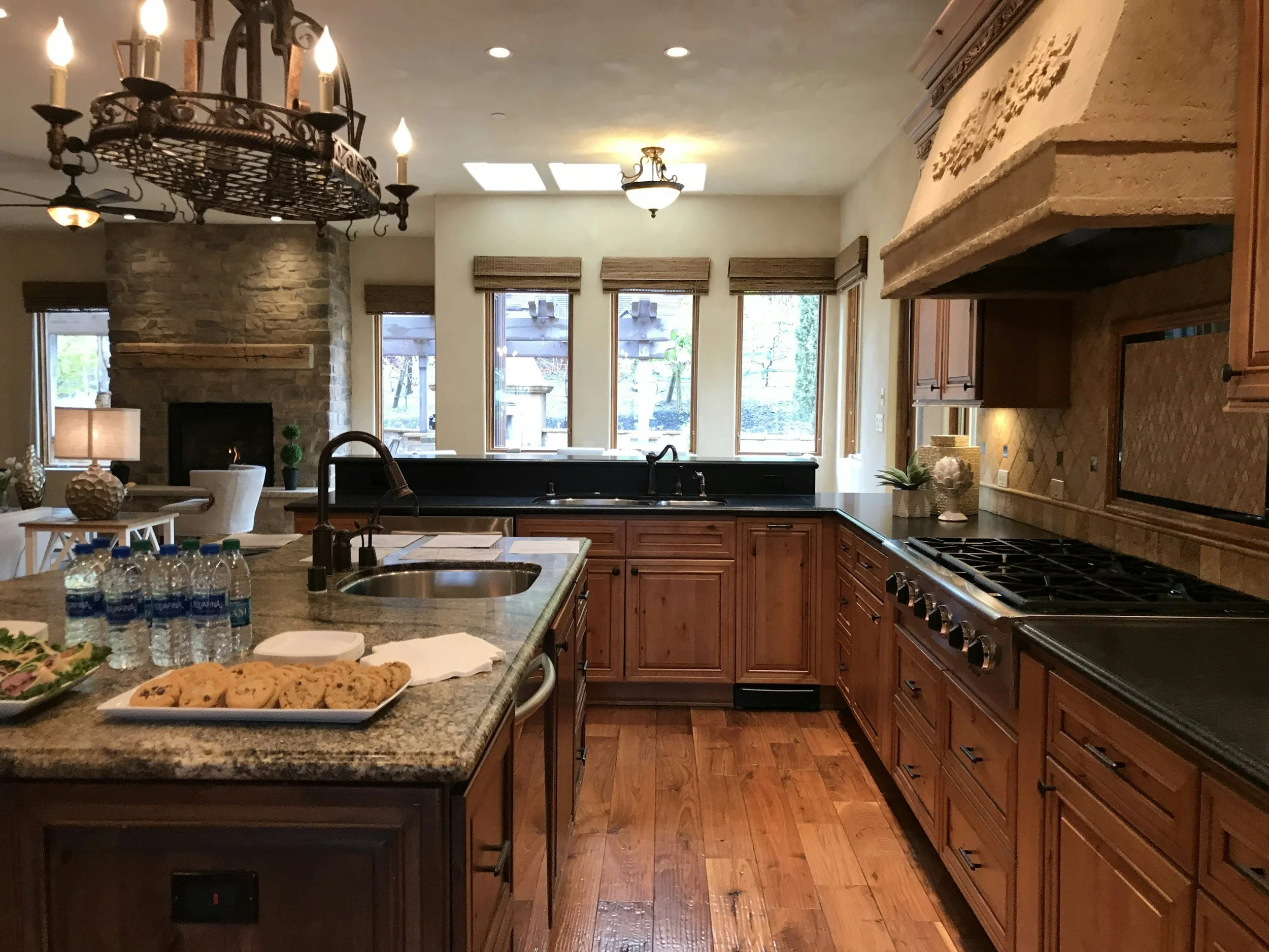 remodeled kitchen with brown wood cabinets