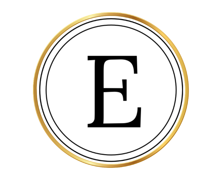 A round black mirror with a gold rim.