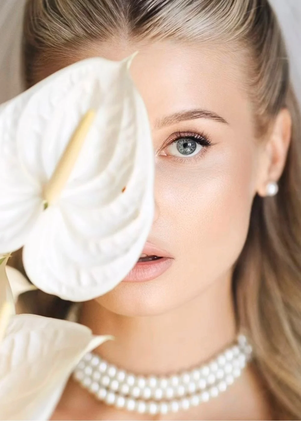 Bridal makeup with natural glow, soft blush, and long-wear finish