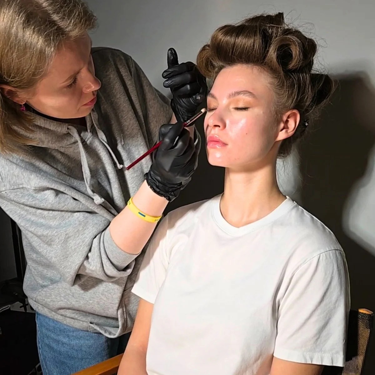 Professional makeup application for a San Francisco downtown photoshoot