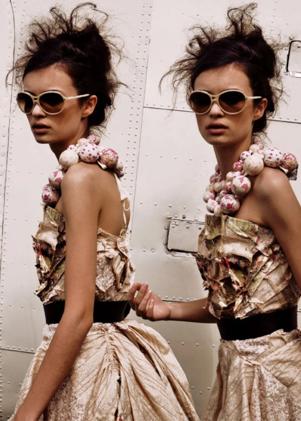 Fashion editorial with a model in beige dress and sunglasses