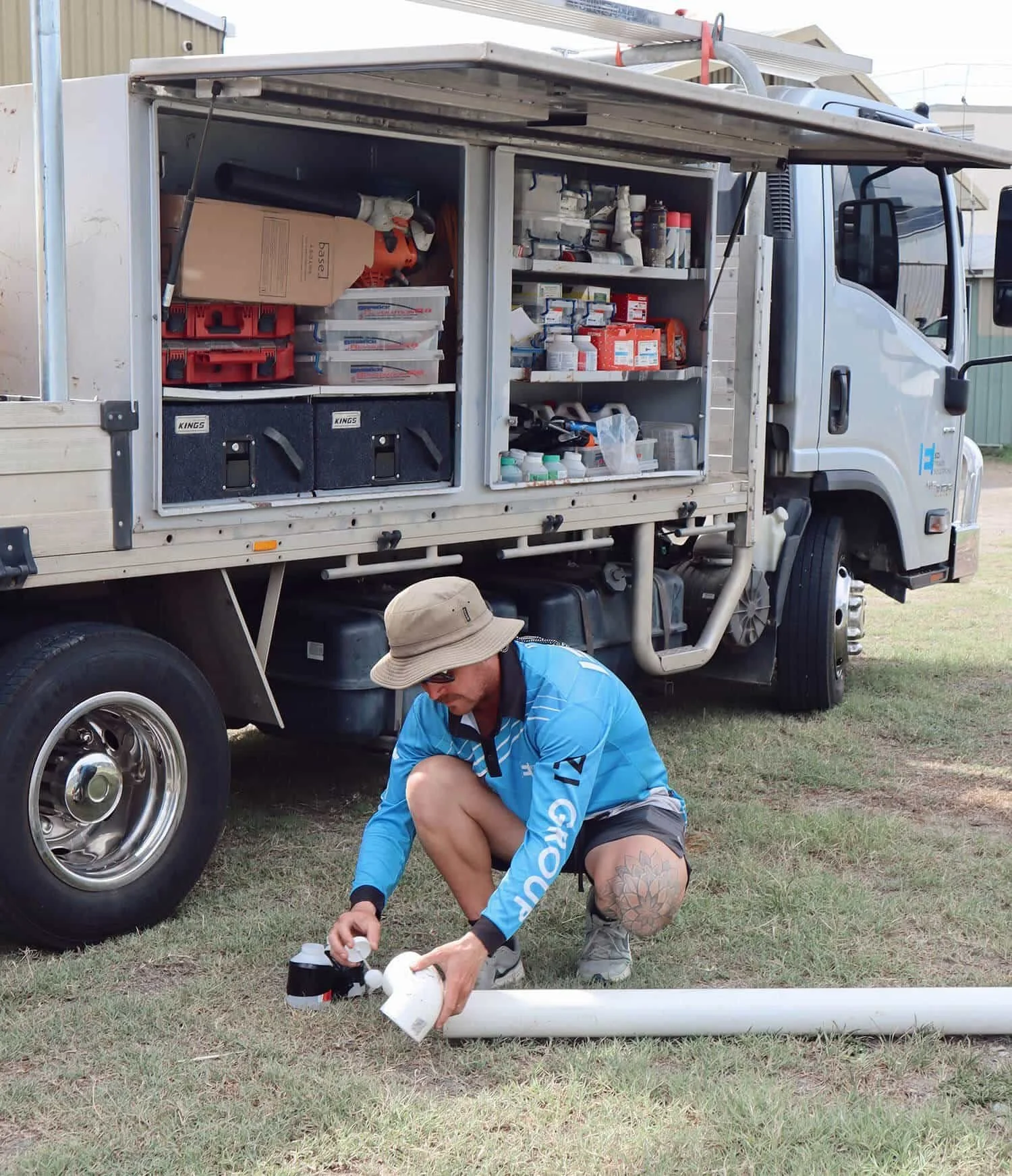 A photo of Michael working on a customer's pipe.