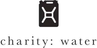 Charity water logo with a black drop icon above the text 'charity: water'
