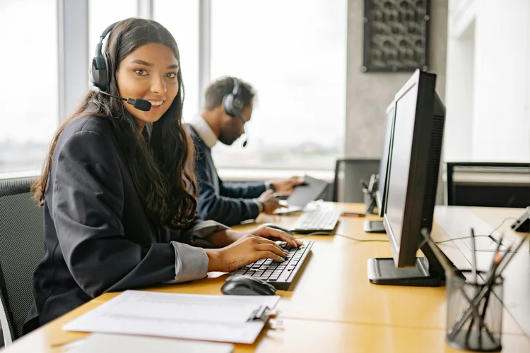 Trained answering service agents handling funeral home calls