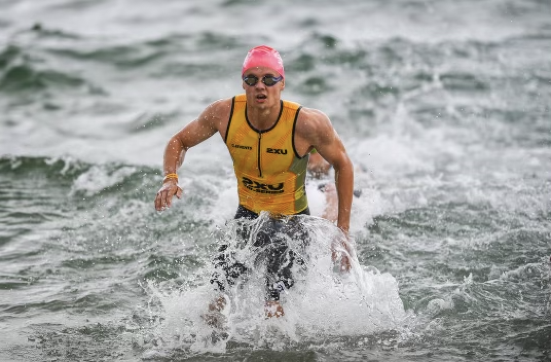 Triathelete giving a google review as he felt the benefits of getting chiropractic treatment and improving his athletic performance.