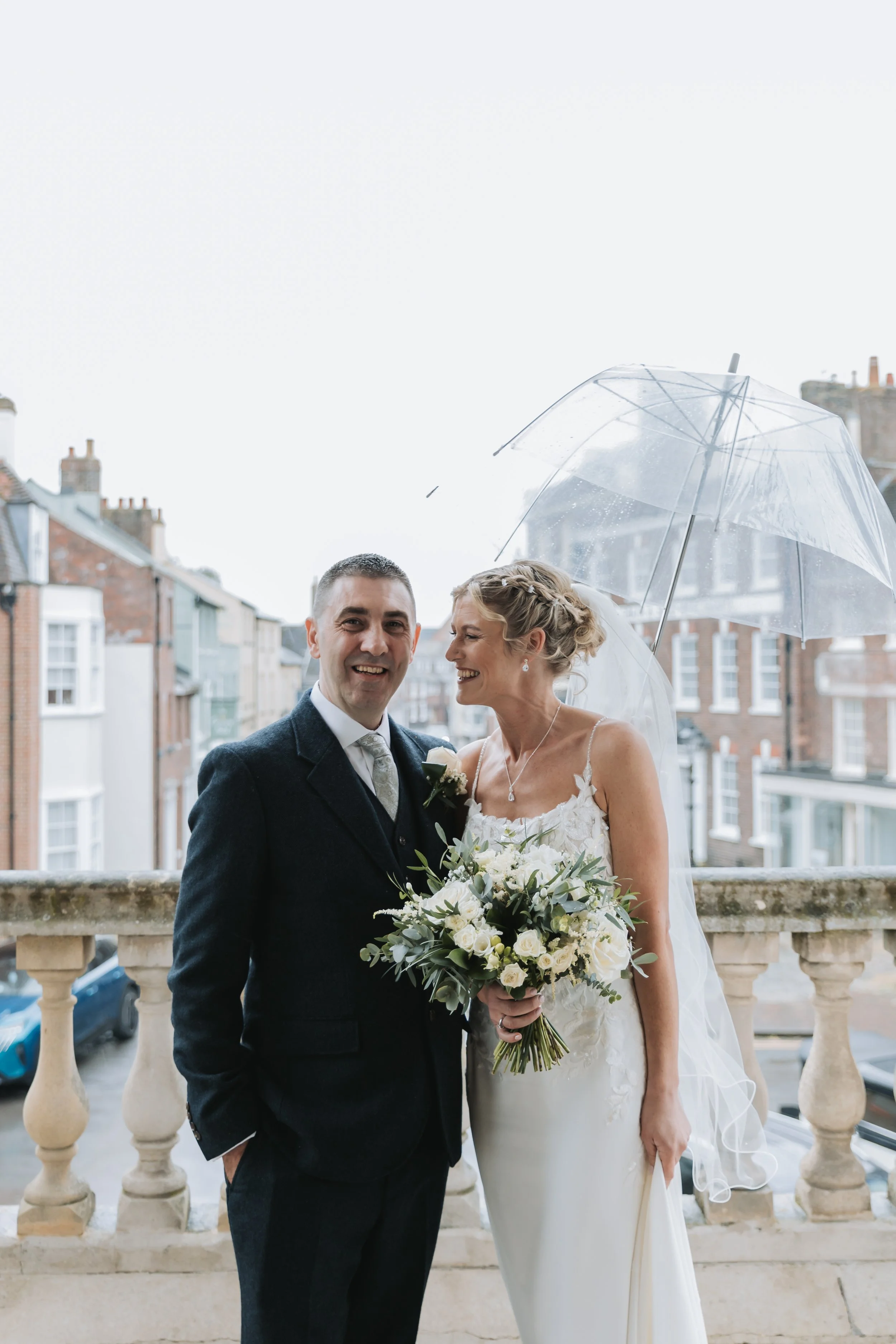 Wedding couple on balcony at Poole Guildhall