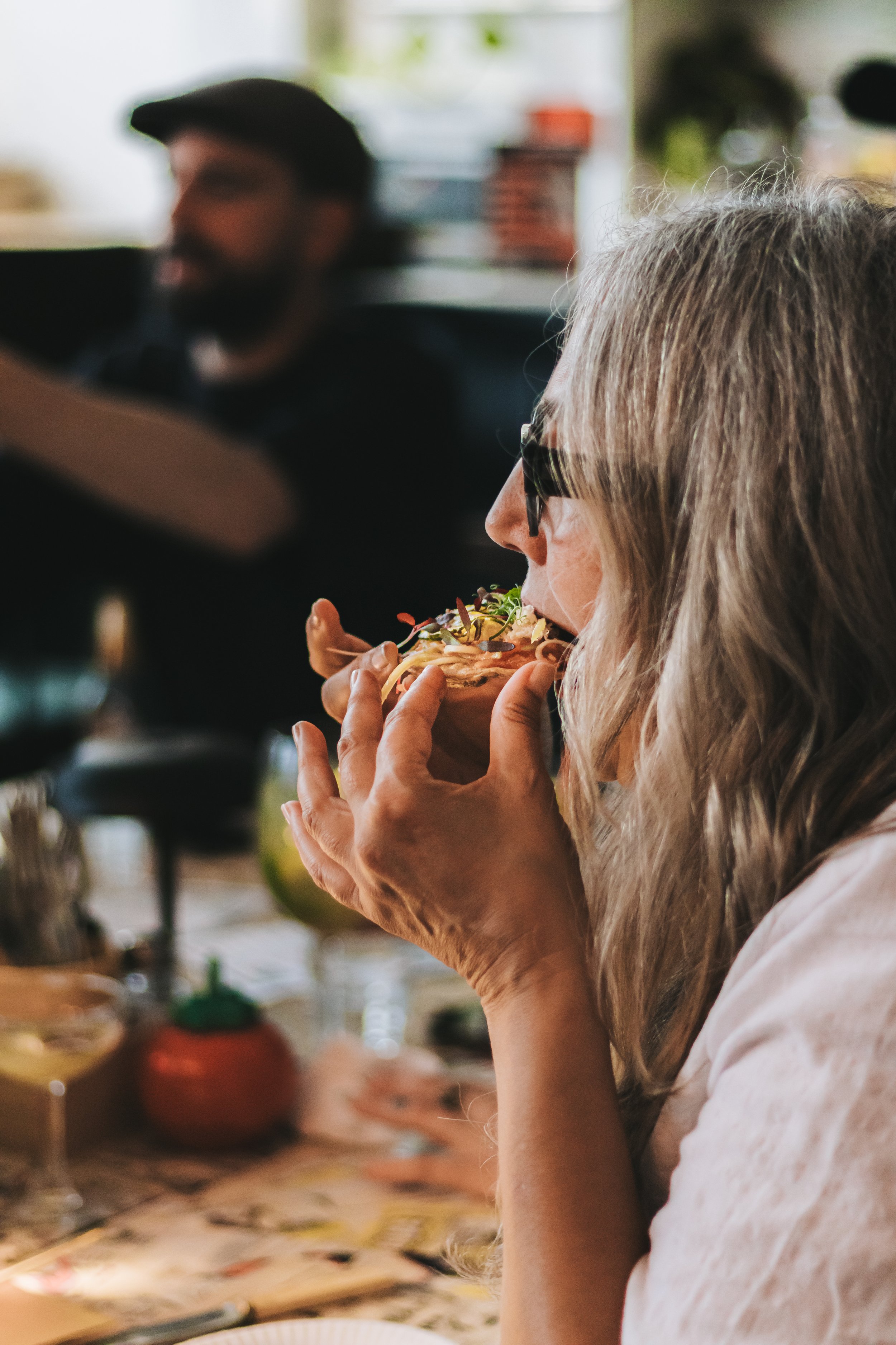 skinny-malinkys-southbourne-woman-eating-taco.jpg
