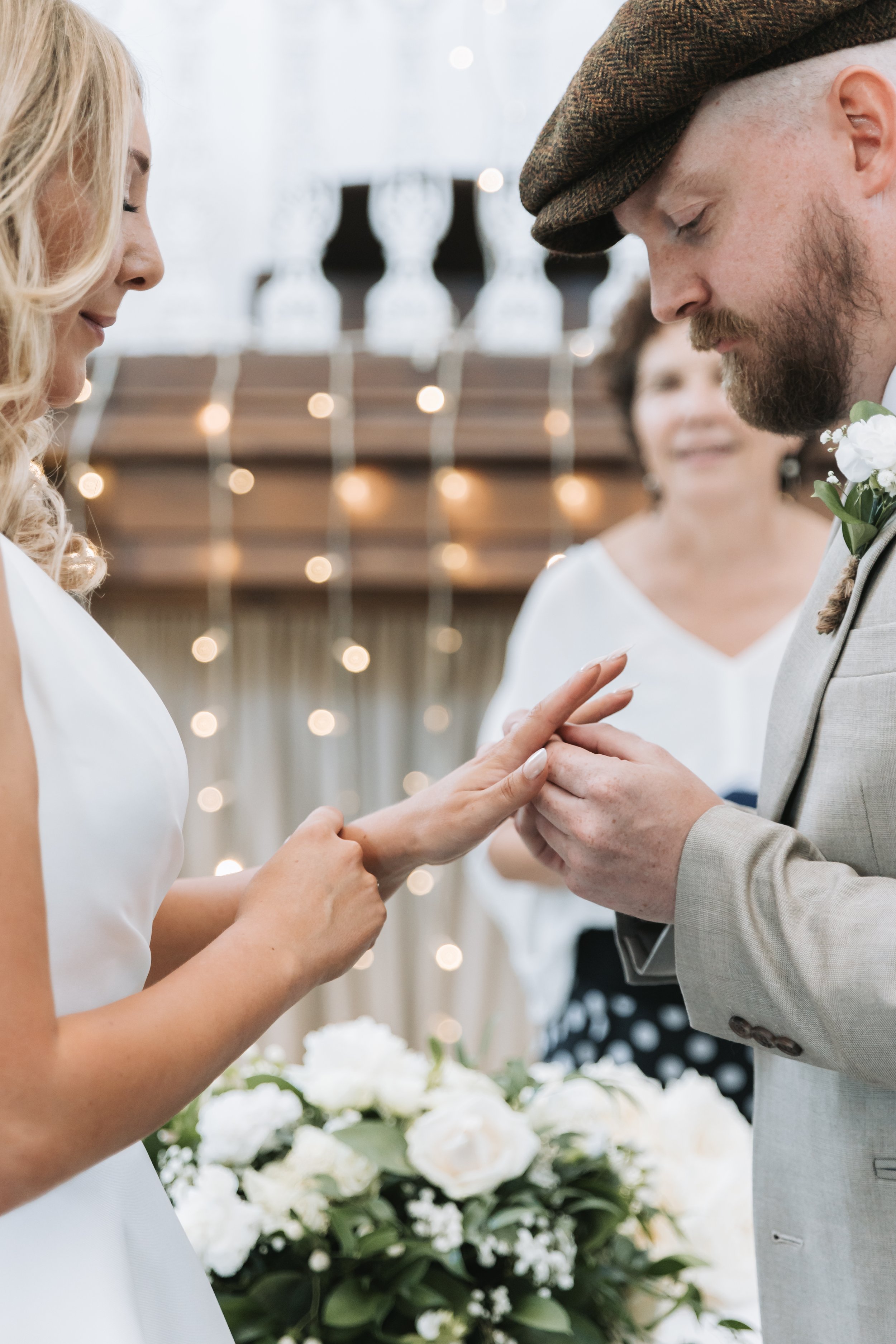 putting-on-wedding-rings-kings-chapel.jpg